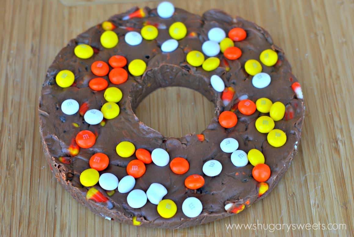 Halloween Fudge Ring on a wooden cutting board.