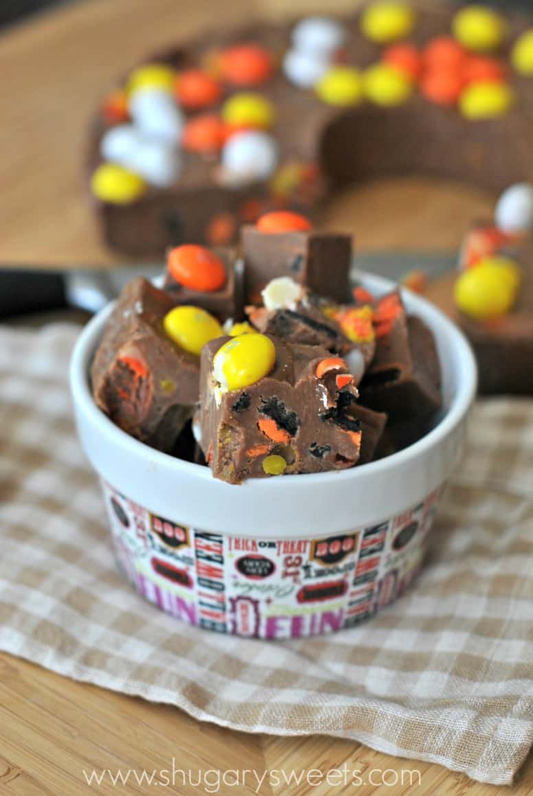 Halloween fudge cut into pieces in a small halloween dish.