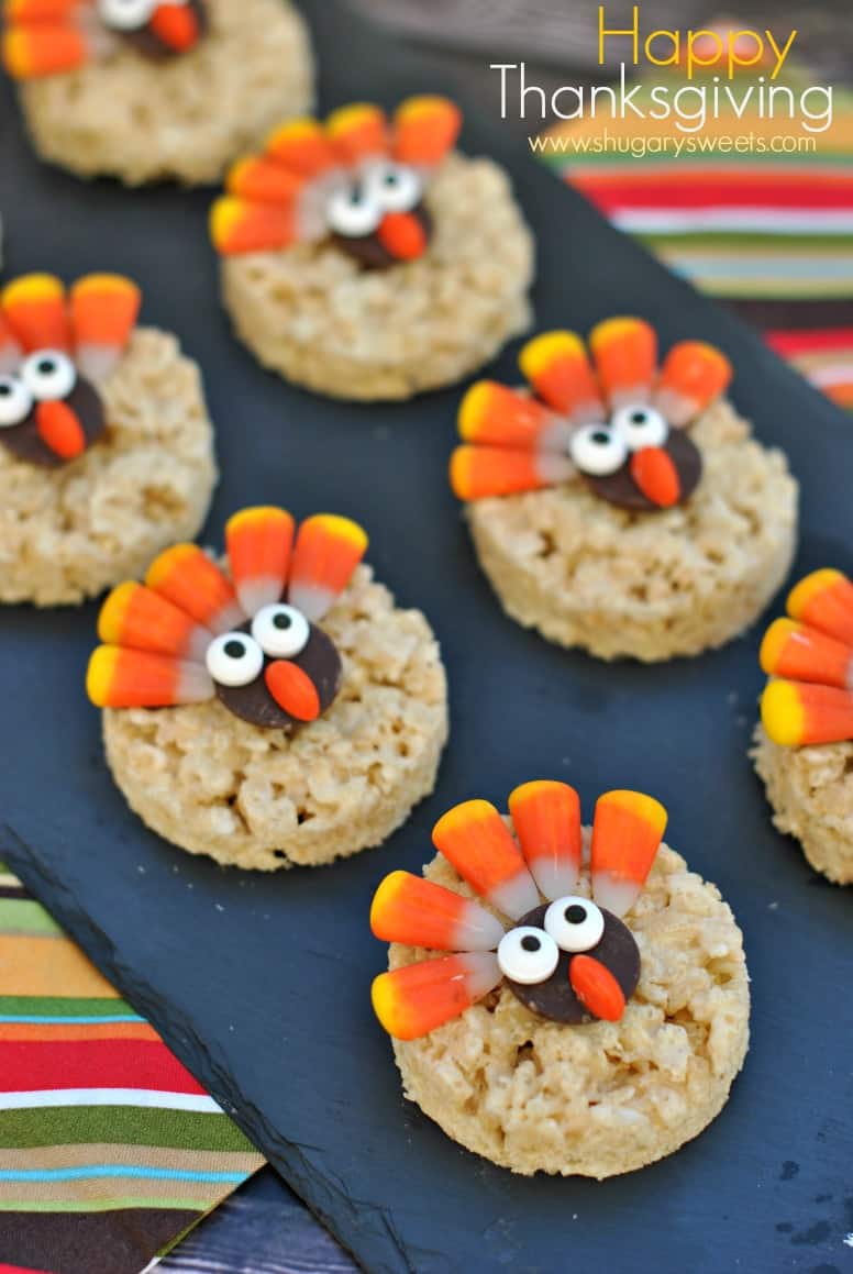 Thanksgiving rice krispie treats cut into circles and decorated to look like turkeys.