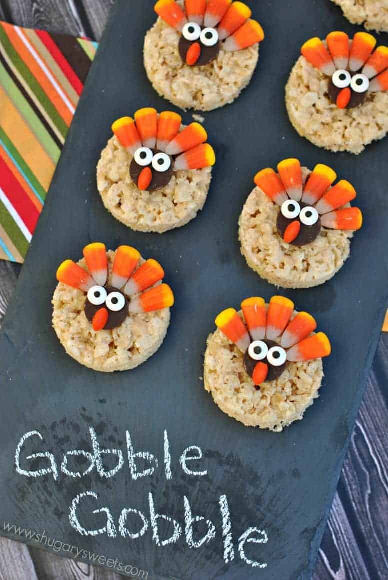 Turkey rice krispie treats on slate serving plate.