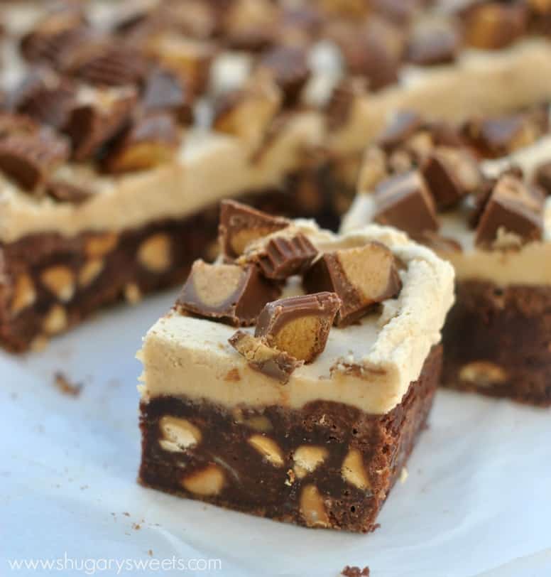 Fudgy Chocolate Brownies with Reese's PB morsels, fluffy Peanut Butter Frosting and chopped Reese's PB Cups!