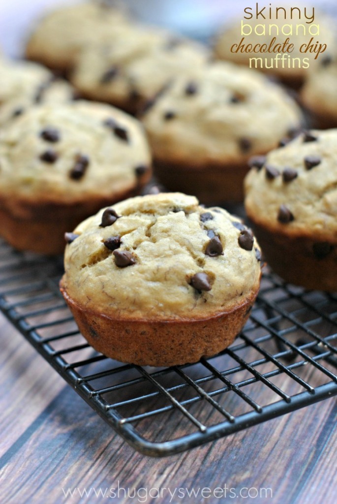 Banana muffins with chocolate chips on a wire cooling rack.