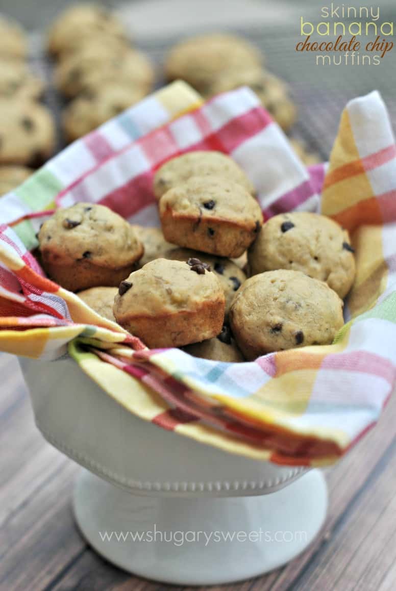 Mini banana chocolate chip muffins a linen lined bowl.