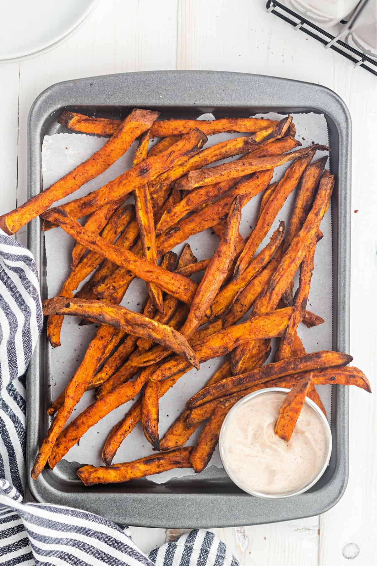 Sweet potato fries on baking sheet.