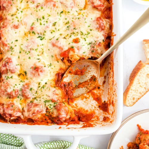 Healthy, baked, Turkey Meatballs in this delicious Meatball Parmesan casserole. Move over Chicken Parmesan, there's a new dinner at the table!