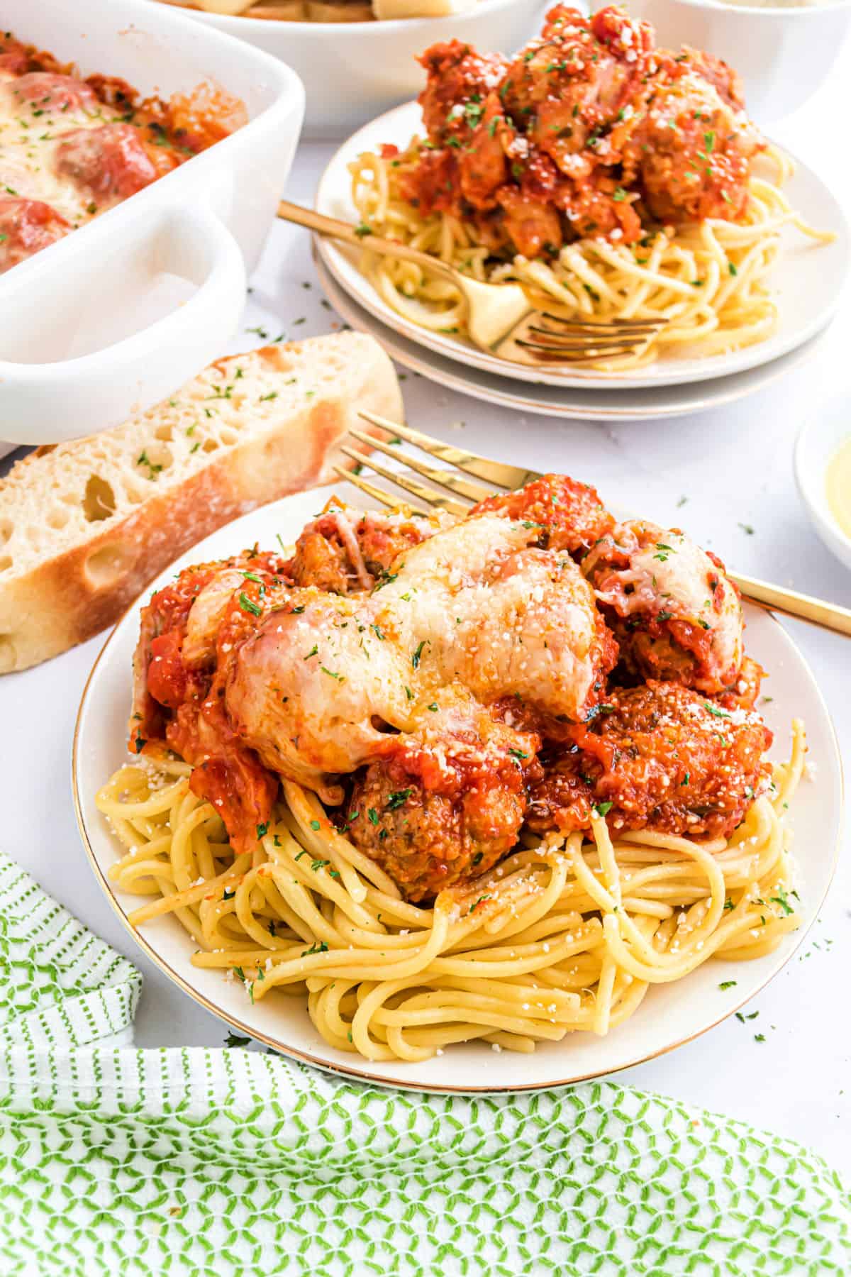 Meatball casserole on a plate with spaghetti noodles.