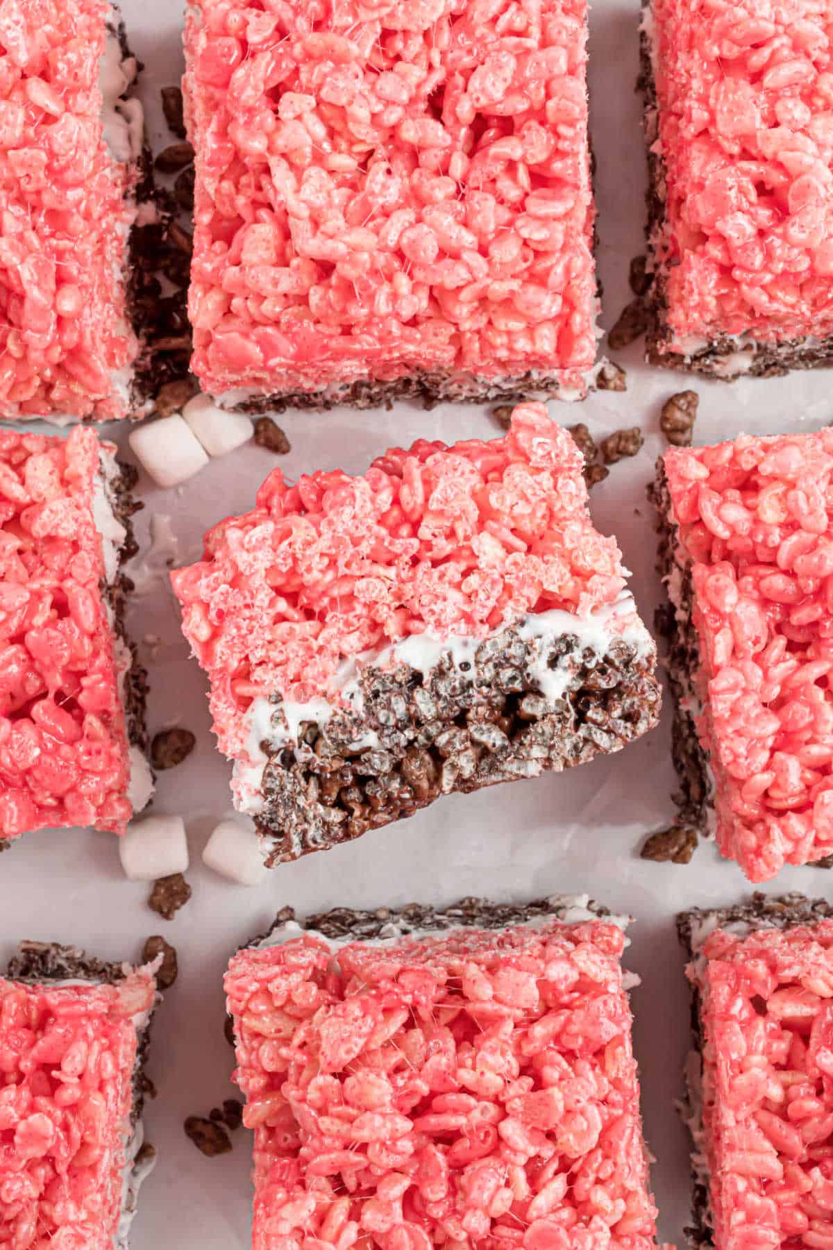 Neapolitan krispie treats cut into bars.