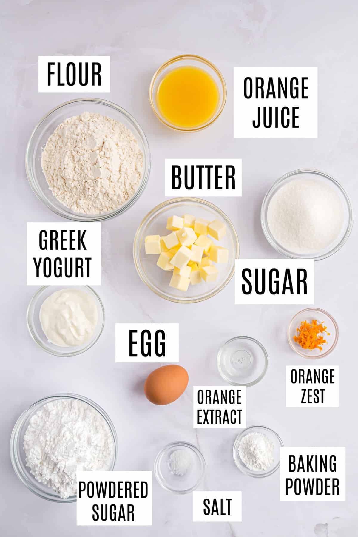 Ingredients needed to make orange scones.