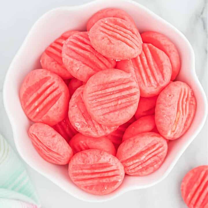 Strawberry Mints are adorably pink candies you can make at home. These easy mints make a perfect gift or addition to any dessert table.