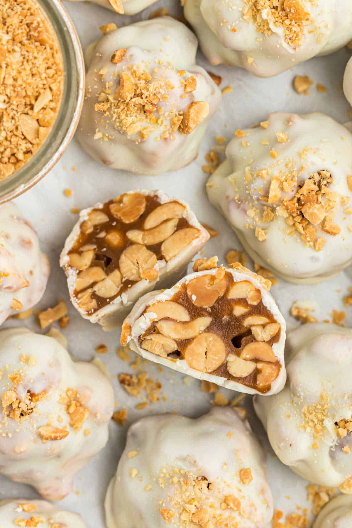 Payday truffles cut in half and dipped in white chocolate.