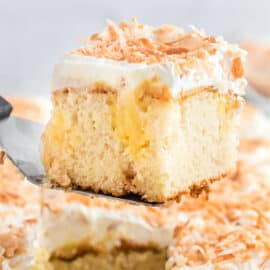 Looking for an easy dessert recipe that delivers impressive results? Make a delicious Coconut Pudding Cake with just a few ingredients! Moist cake with a creamy cool whip topping gets even better when you add a sprinkle of toasted coconut on top.