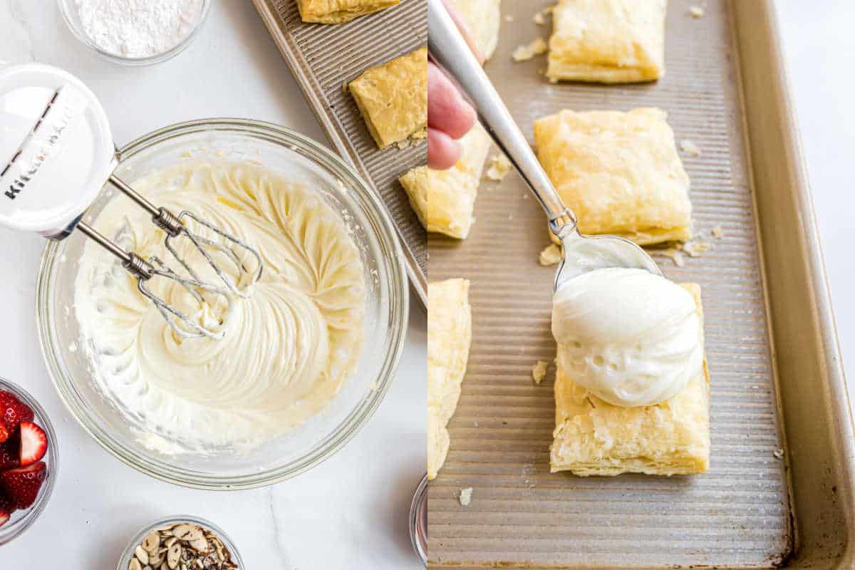 A bowl of whipped cream cheese mix and a spoon topping puff pastry squares on a baking sheet for strawberry cheesecake napoleons.