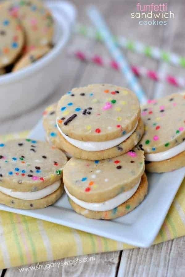 Funfetti Shortbread Cookie Sandwiches  stacked on a white plate.