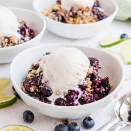 The classic blueberry dessert gets a zesty lime twist! Our Blueberry Crumble recipe has a crunchy layer of sugar and oats that is perfect served warm with homemade whipped cream or vanilla ice cream for the complete experience!