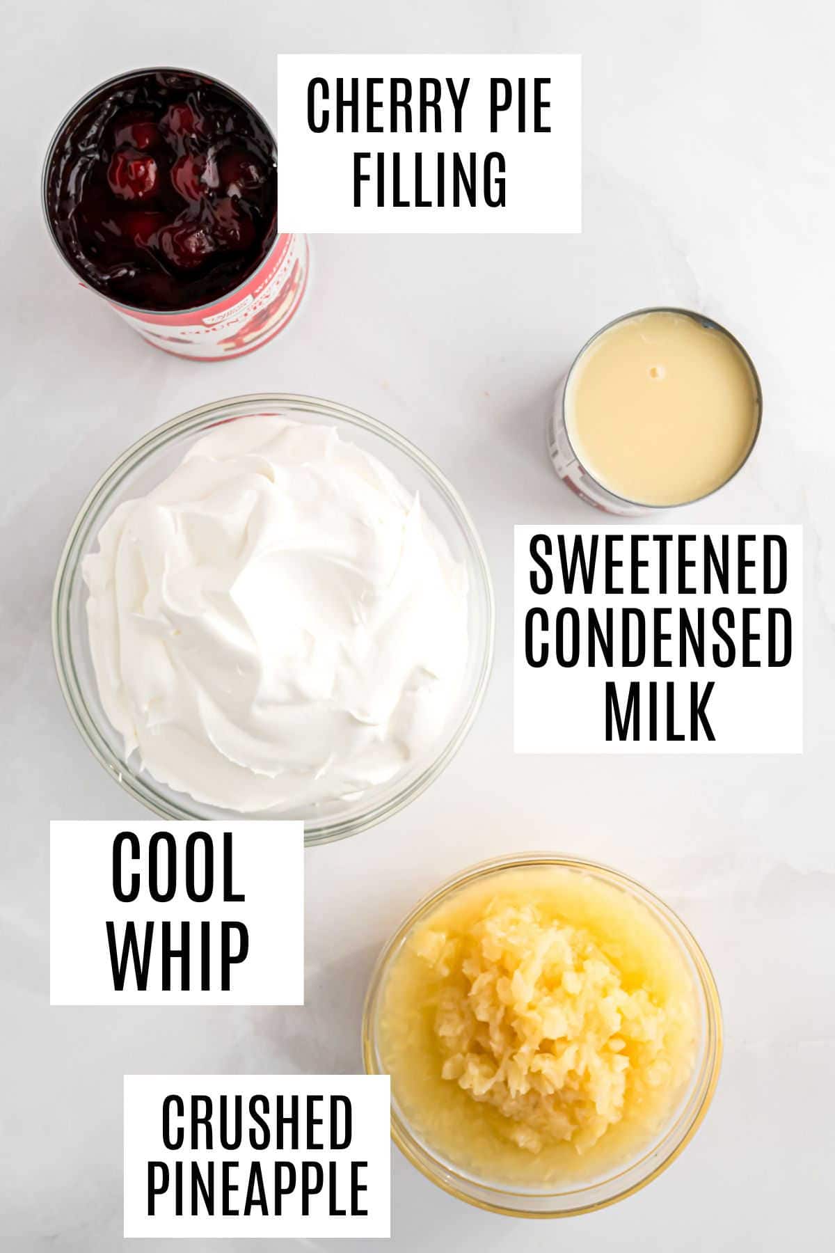Four labeled ingredients for cherry dump salad: cherry pie filling, sweetened condensed milk, Cool Whip, and crushed pineapple.