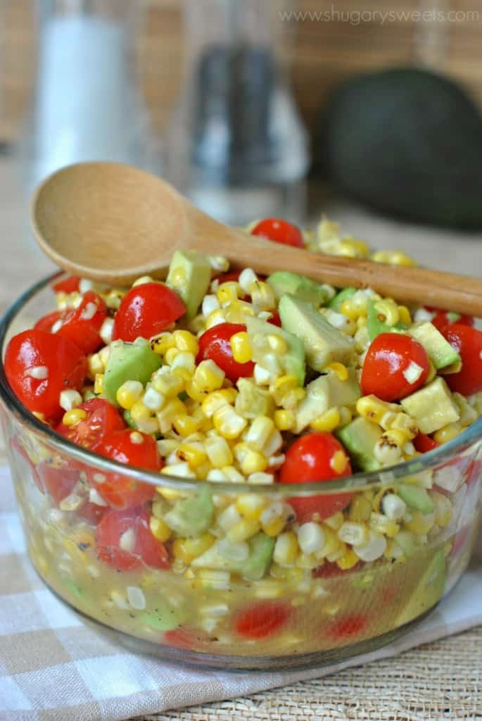 Roasted Corn Salad with Honey Lime Dressing, tomatoes and avocado! A new favorite recipe at our house!