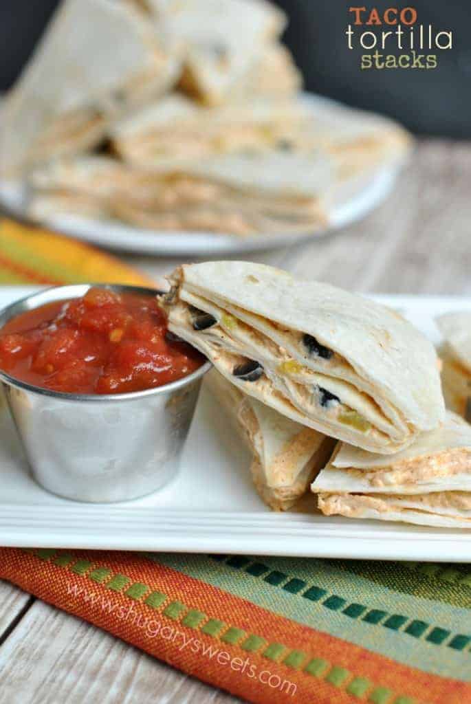 Easy Taco Tortilla Stacks recipe for a quick, delicious snack/appetizer! These go fast in our house!