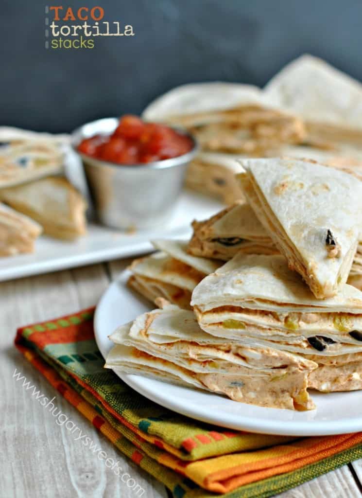 Easy Taco Tortilla Stacks recipe for a quick, delicious snack/appetizer! These go fast in our house!