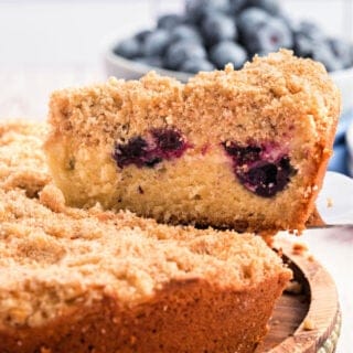 Blueberry Cream Cheese Coffee Cake is a moist and fluffy breakfast cake filled with juicy blueberries. The crunchy almond streusel topping and soft cream cheese layer are the perfect match for a mug of freshly brewed coffee!