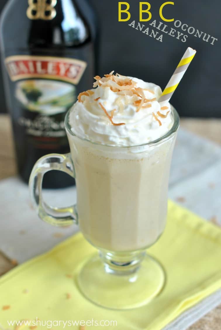 BBC drink in a mug with toasted coconut and whipped cream.