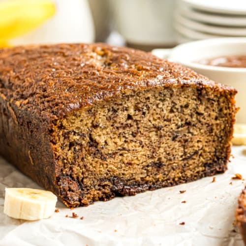 Delicious and moist, this Nutella Banana Bread is begging to be made! It freezes well too, so make one loaf to eat today and another to stash away in the freezer for a rainy day.