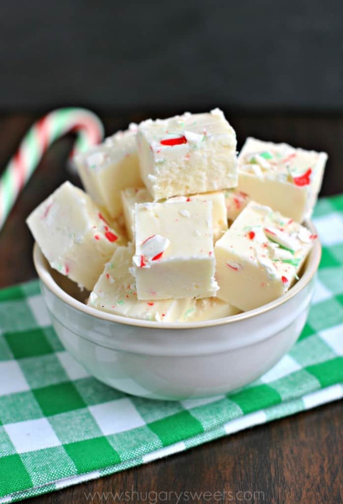 Candy Cane Fudge: a sweet fudge packed with crushed peppermint candy canes. Fun and festive for Christmas gift giving!
