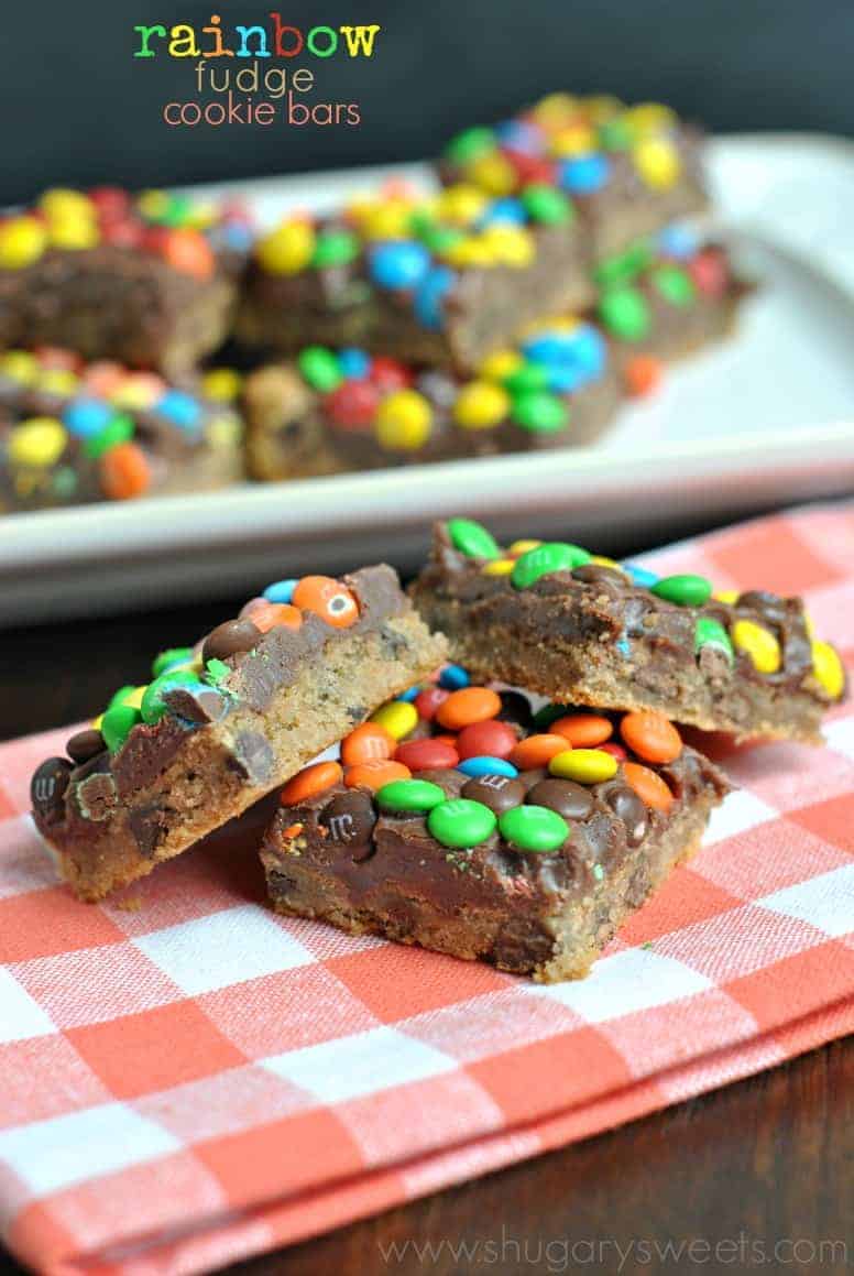 Chocolate chip cookie bars with fudge and rainbow candies.