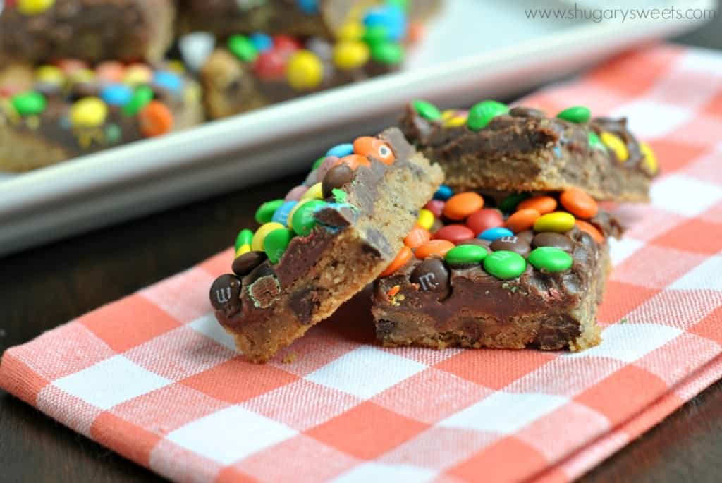 Rainbow Fudge Cookie Bars recipe with 4 simple ingredients! Soft, chewy cookies with a layer of fudge and candy!