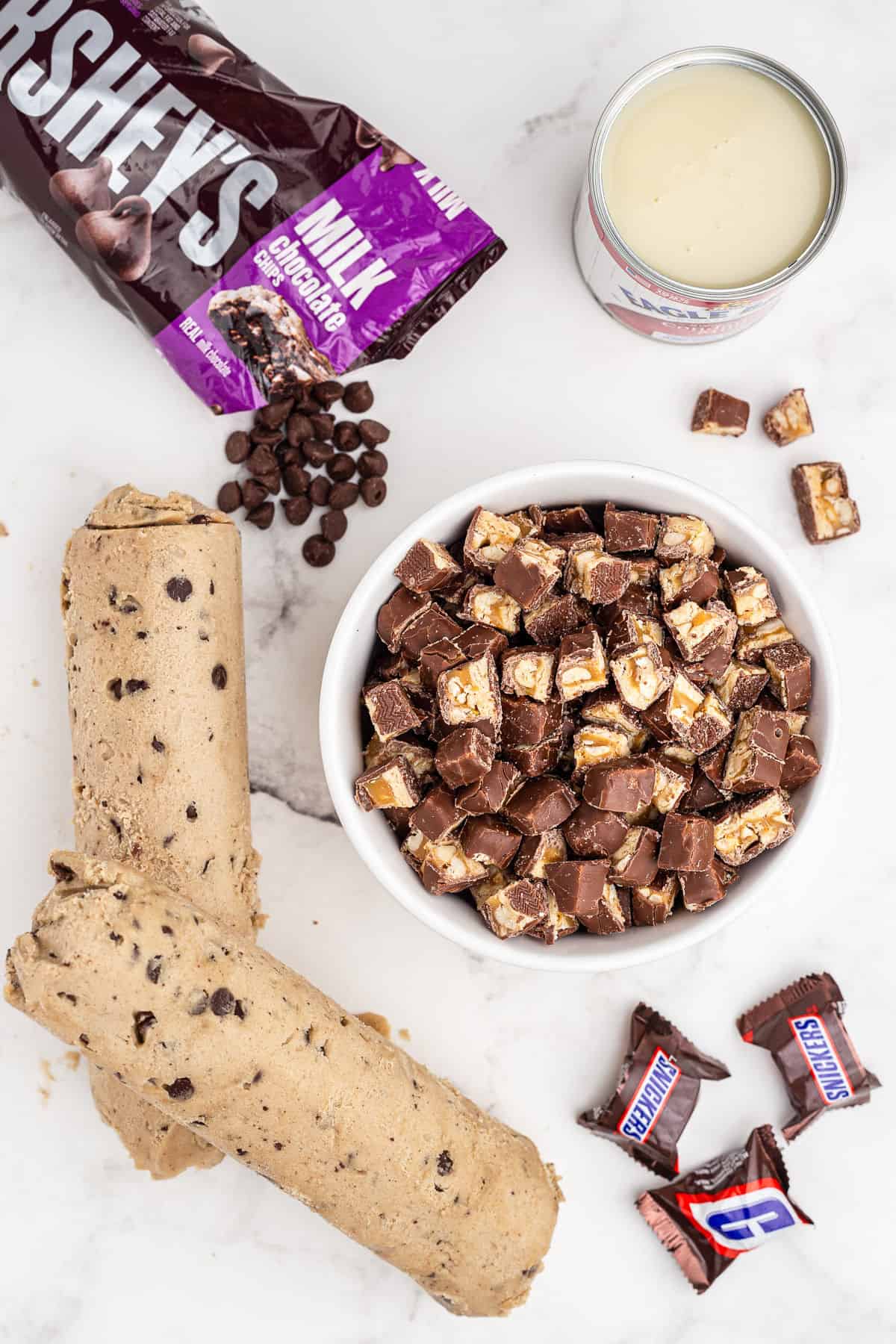 Four ingredients needed for chocolate chip snickers bar recipe.