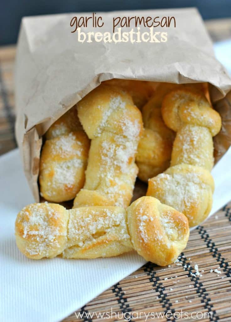 Breadsticks twisted into a bone shape and topped with garlic parmesan.