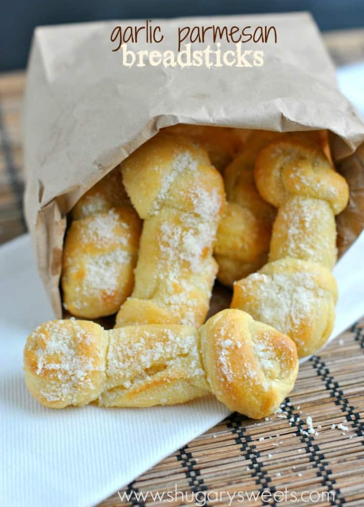 Breadsticks twisted into a bone shape and topped with garlic parmesan.