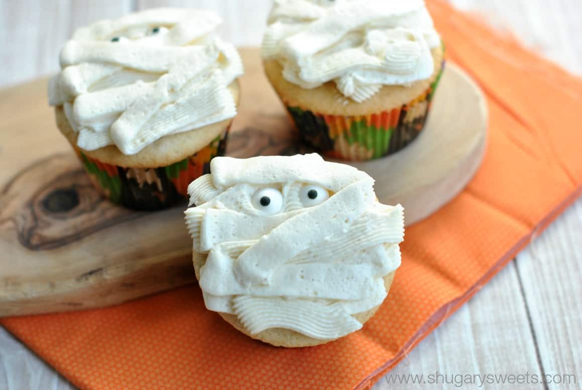 Vanilla cupcakes frosted to look like mummies for Halloween.