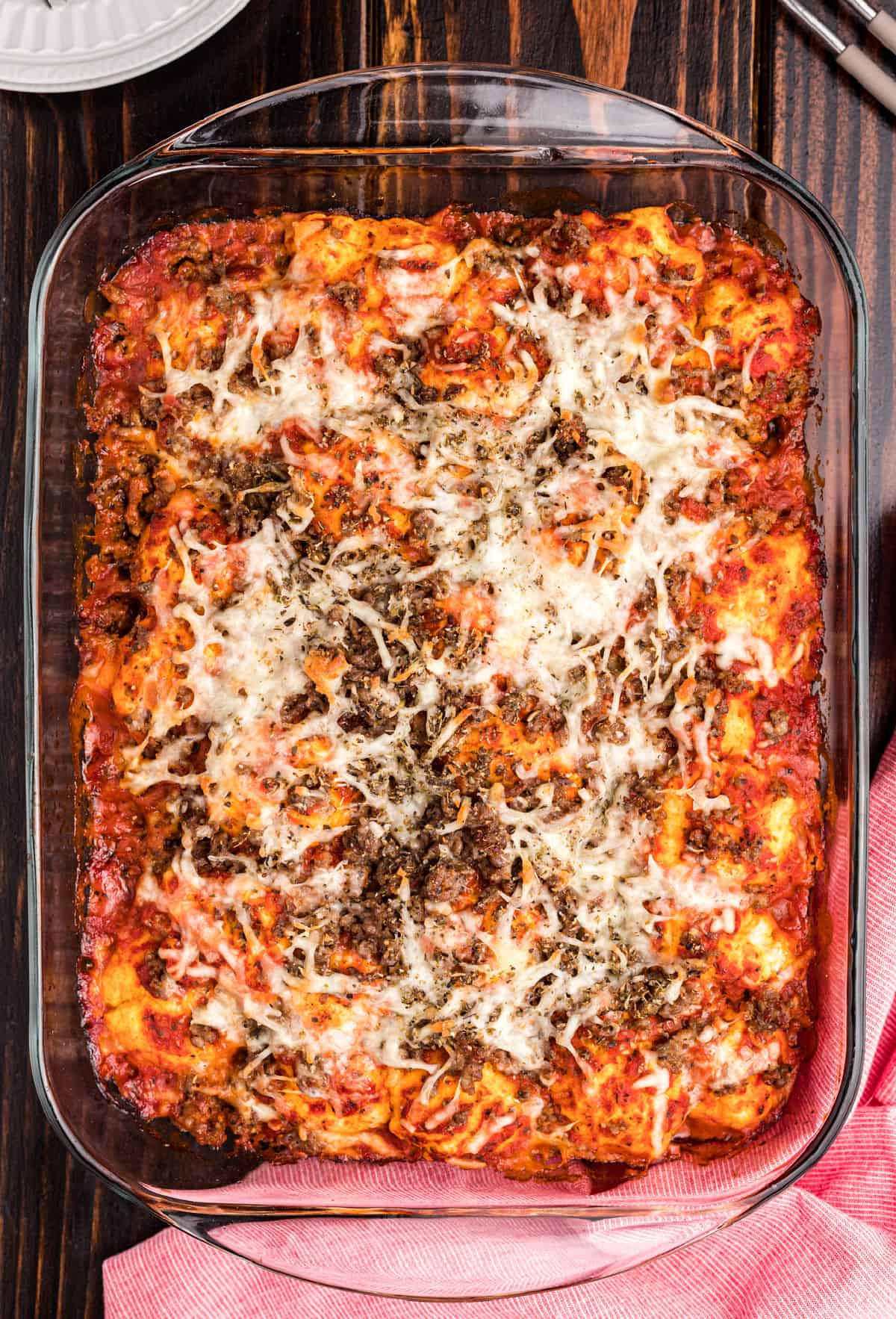 Bubble up pizza casserole baked in a 13x9 dish.