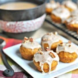 Pumpkin Muffins with Maple Pecan Glaze. Delicious bite sized breakfast treat!