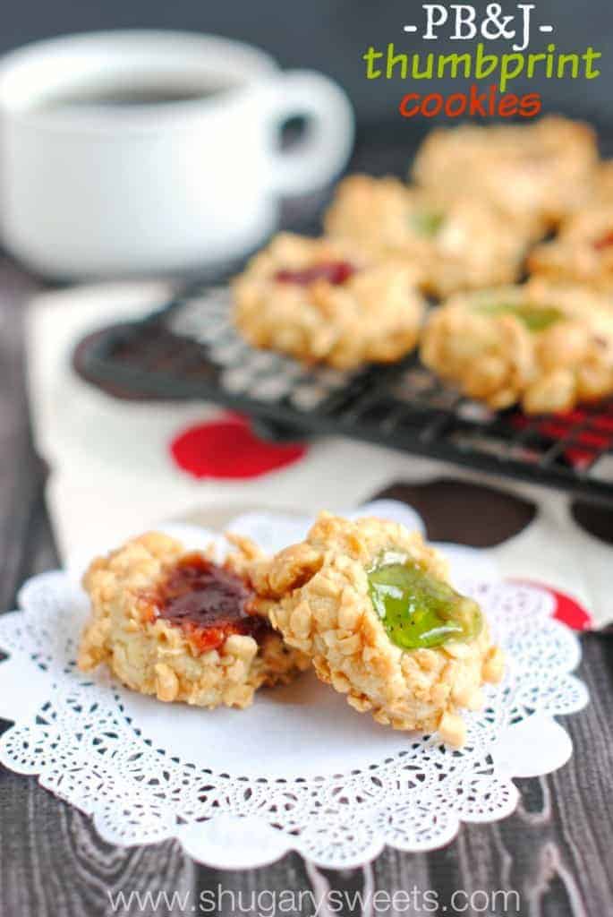 Thumbprint Cookies: delicious cookies wrapped in chopped peanuts and a dollop of jelly! Festive for Christmas!