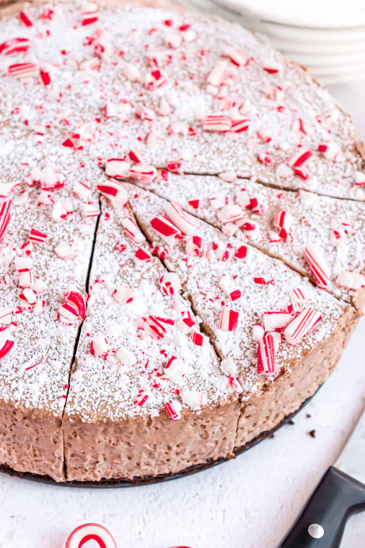 Hazelnut mousse pie topped with peppermint candy.