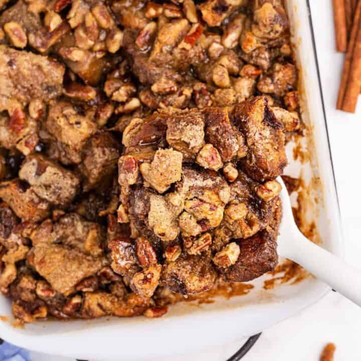 Overnight french toast casserole with pecans in a baking dish.