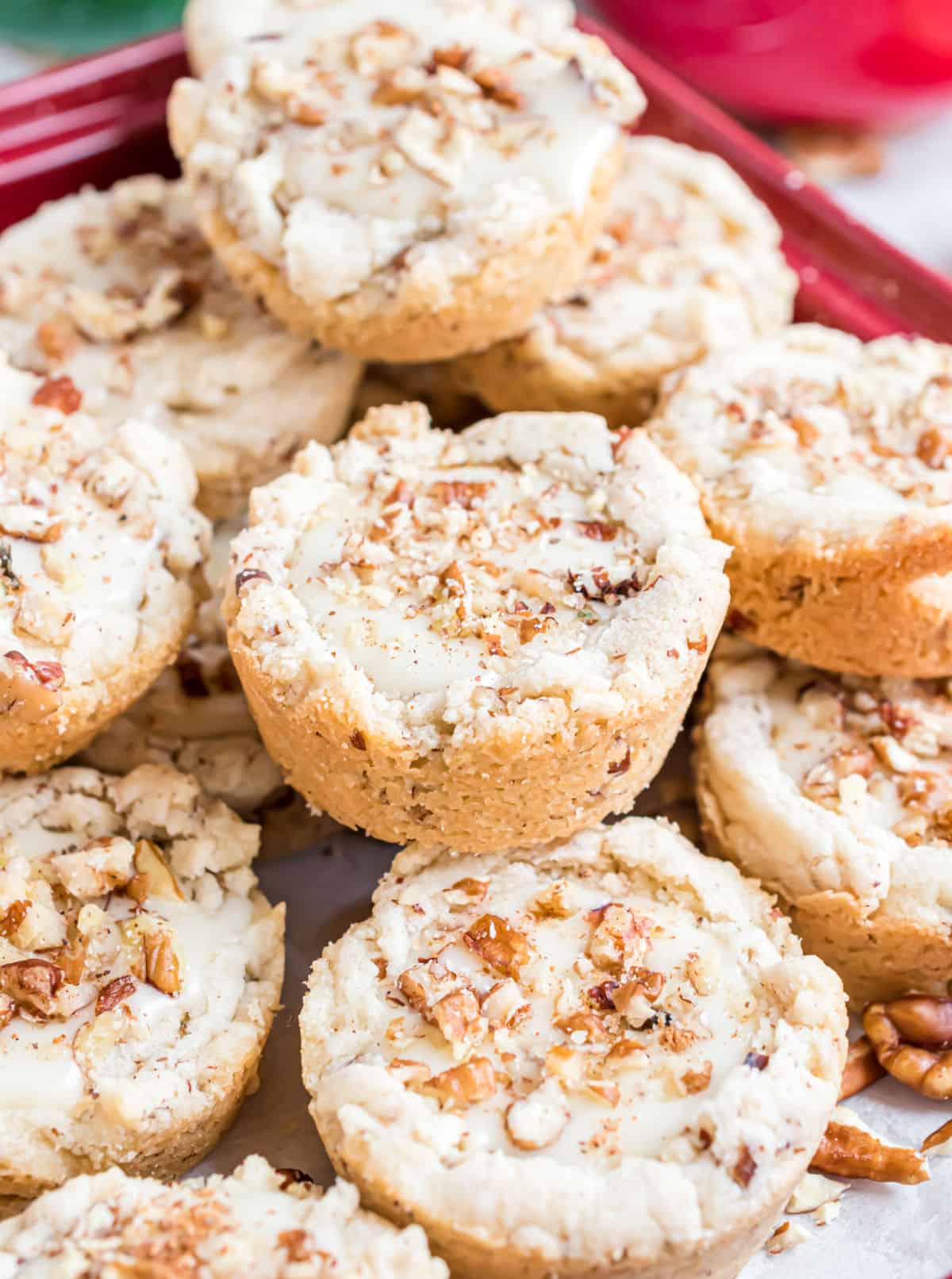 Stack of pecan eggnog cookies on a plate.