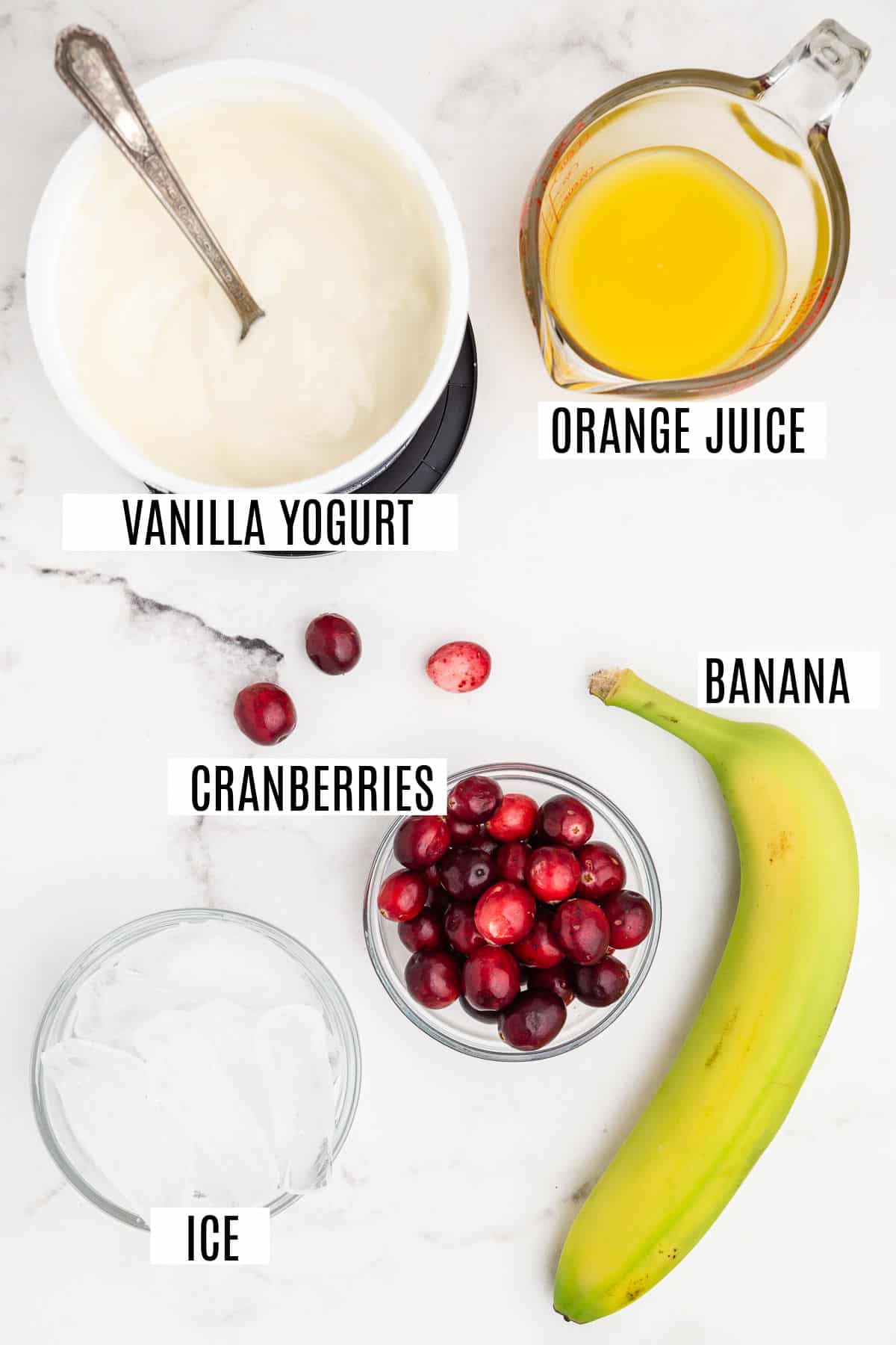 Ingredients needed for a cranberry orange smoothie.