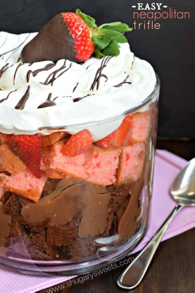 Easy Neapolitan Trifle recipe: layers of chocolate cake, pudding, strawberry cake, fresh berries and Cool Whip!