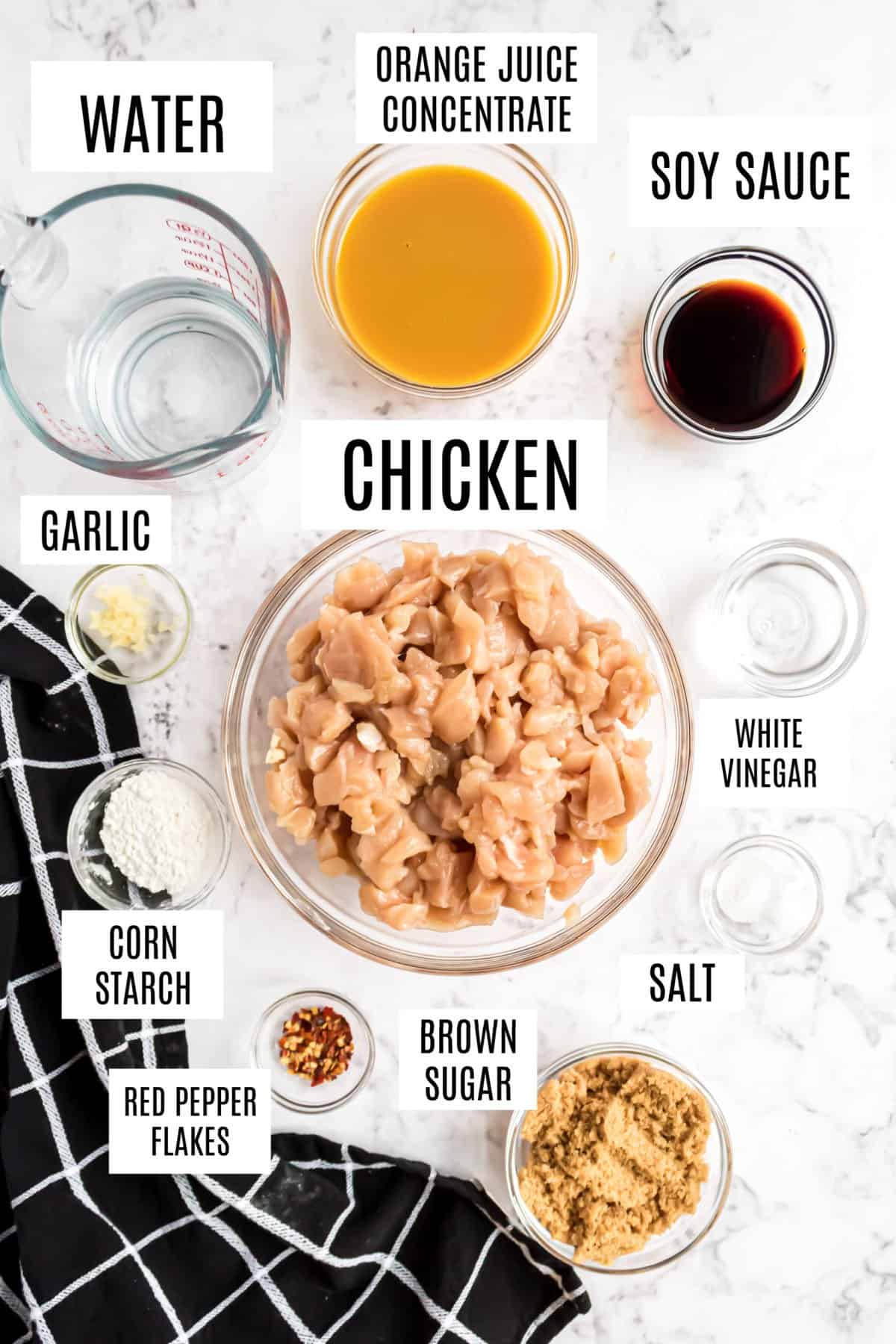 Ingredients needed to make slow cooker orange chicken.