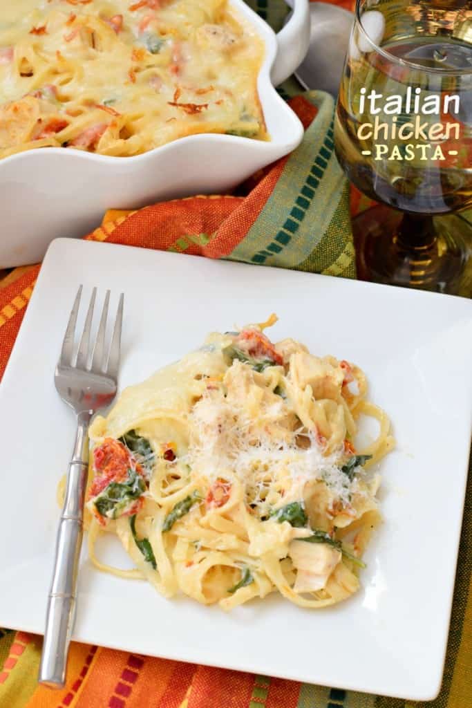 Creamy pasta filled with chicken, sun dried tomatoes and spinach! Bake in a casserole topped with lots of cheese, YUM!