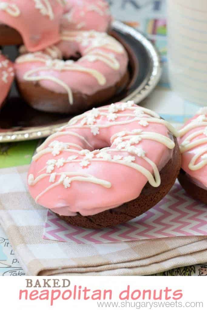 Neapolitan Donuts: baked chocolate donuts with a strawberry glaze and white chocolate drizzle. Ready in 30 minutes!