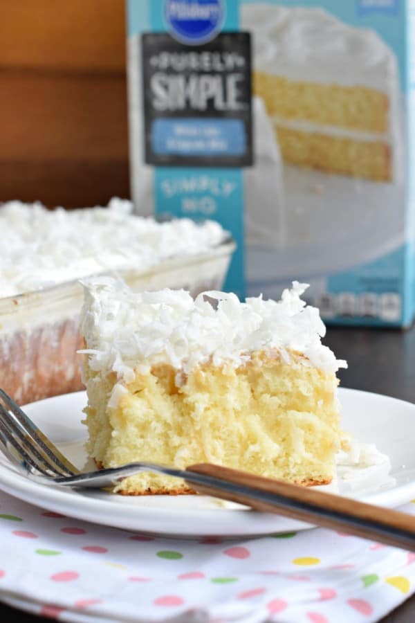 Coconut Cream Poke Cake recipe is perfect for a brunch, potluck or a sweet dessert after any meal. Light and delicious!