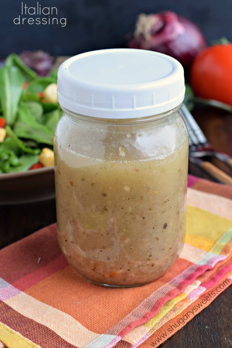 Italian dressing in a mason jar with a white lid.