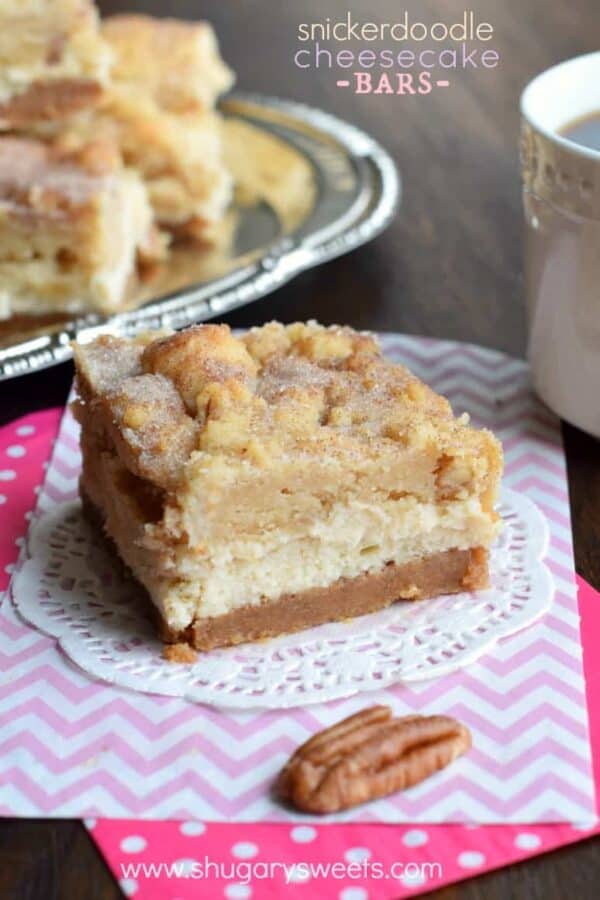One bite of these Snickerdoodle Cheesecake Bars and you'll fall in love! The sweet and salty graham cracker pecan crust with the creamy cheesecake layer is all topped to perfection with the snickerdoodle pecan cookie topping! #cheesecake #snickerdoodle #cookiebars Snickerdoodle Cheesecake Bars: delicious sweet and salty crust, creamy cheesecake filling topped with a cinnamon sugar pecan cookie! #thinkfisher