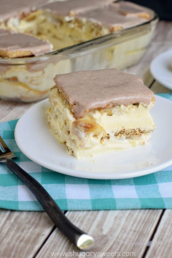 Layers of cinnamon graham crackers, vanilla pudding and fresh banana make this no bake Banana Eclair Cake a huge summer hit! To top it off, I literally topped it off a cinnamon glaze!
