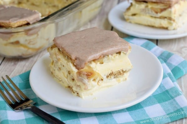 Layers of cinnamon graham crackers, vanilla pudding and fresh banana make this no bake Banana Eclair Cake a huge summer hit! To top it off, I literally topped it off a cinnamon glaze!