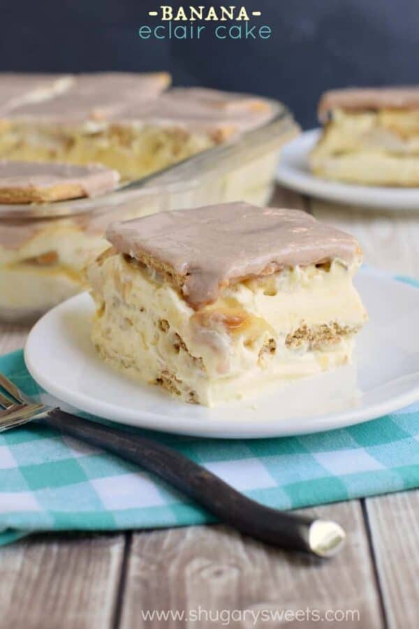 Layers of cinnamon graham crackers, vanilla pudding and fresh banana make this no bake Banana Eclair Cake a huge summer hit! To top it off, I literally topped it off a cinnamon glaze!