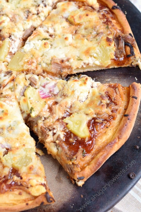 Delicious Hawaiian Pizza using Kalua Pork, goat cheese, bbq sauce and more! Even the crust is easy to make for this incredible dinner idea!